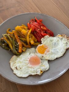 Huevos a la plancha con pimientos